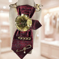 Deep maroon and gold handcrafted women's statement tie with sculpted centerpiece — Re Tied by M.W. Designs